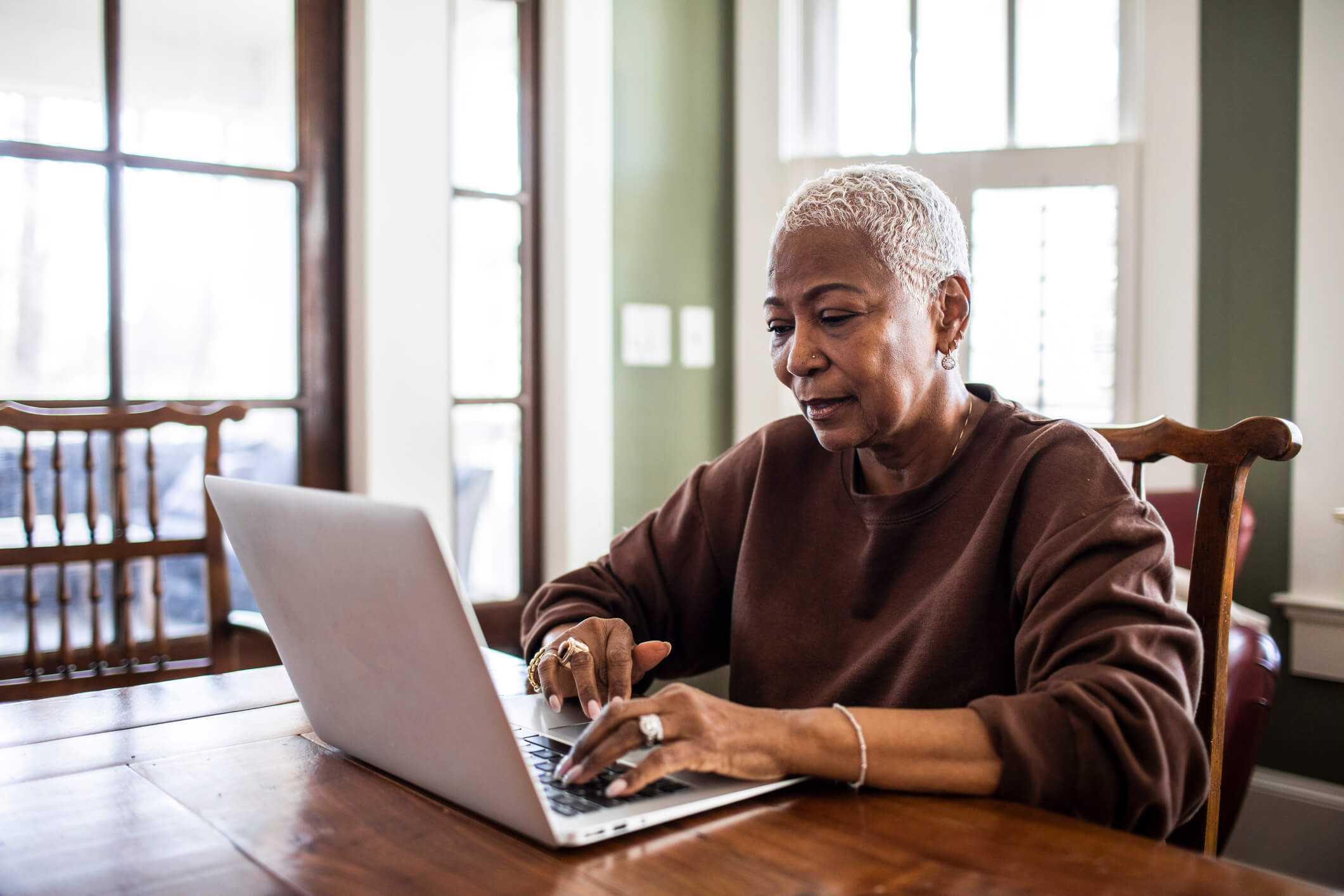 Older black woman on computer.