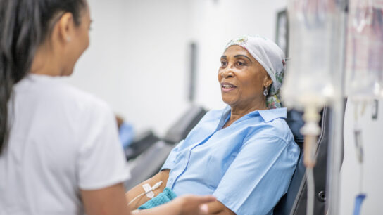 Senior adult woman in the oncology unit receiving chemotherapy