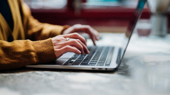 Woman on computer.