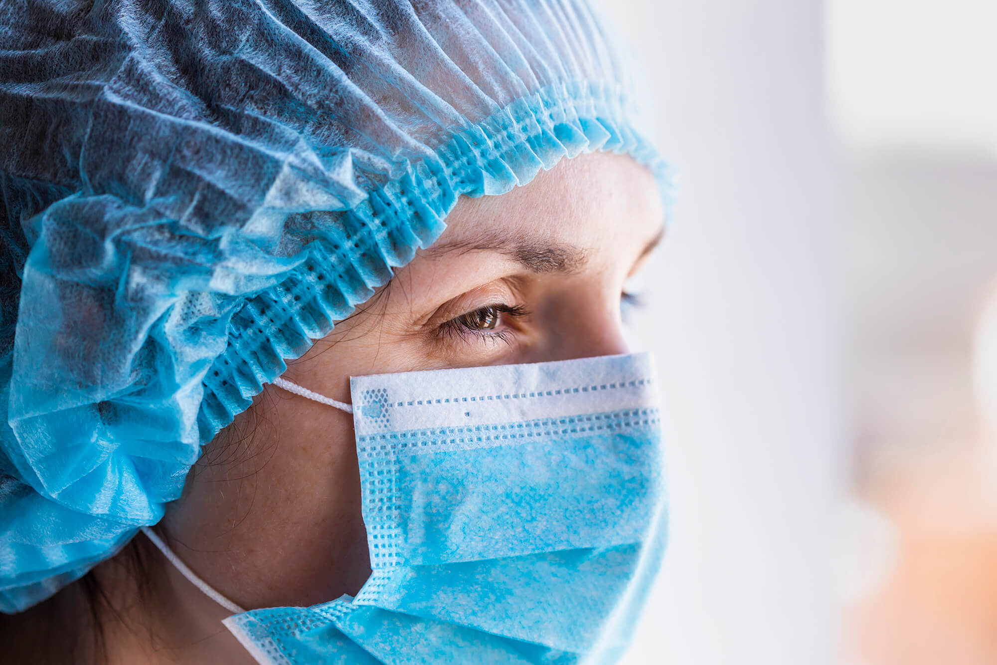 A nurse wearing a protective facial mask.