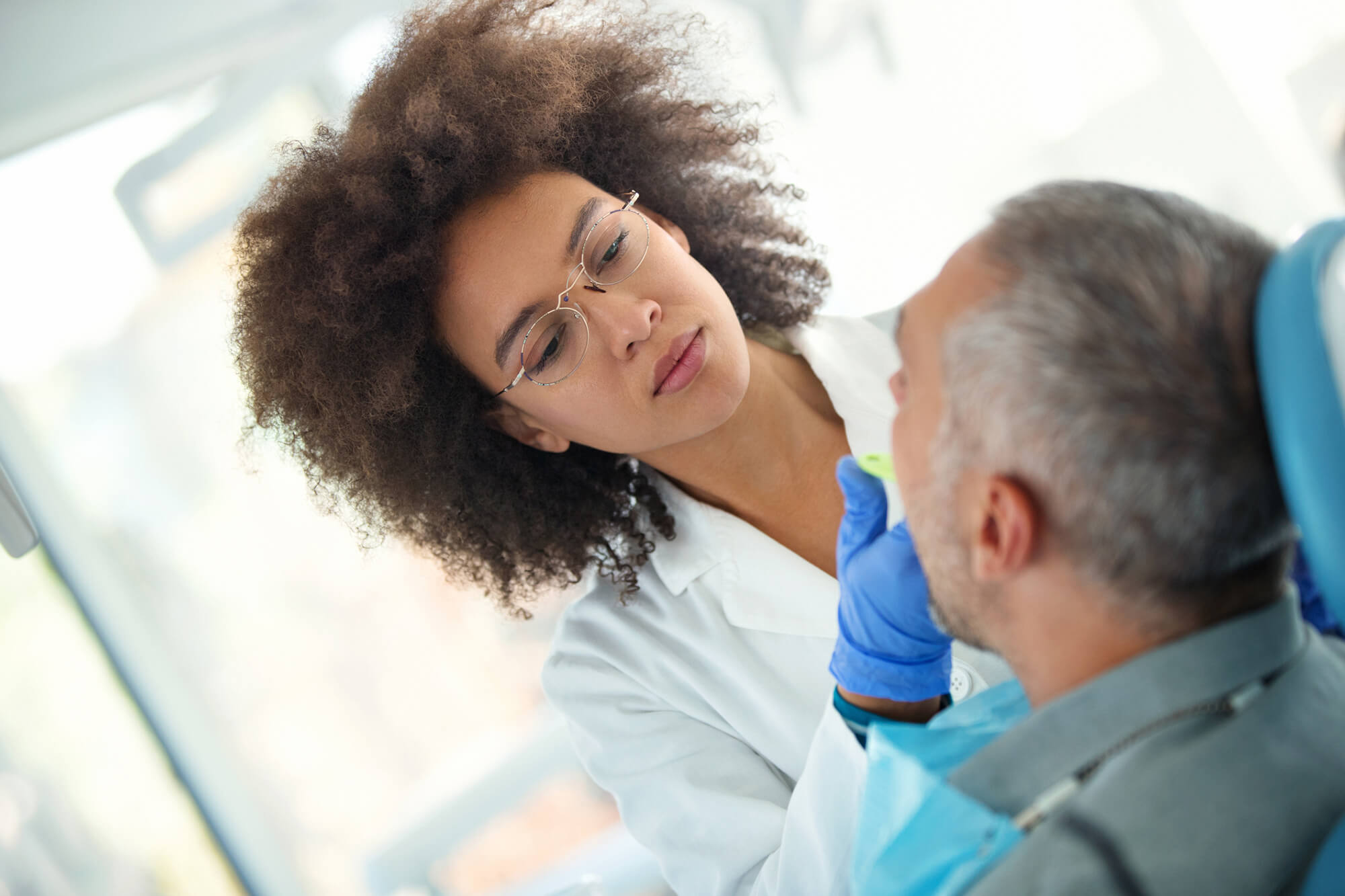 Receiving a dental exam.