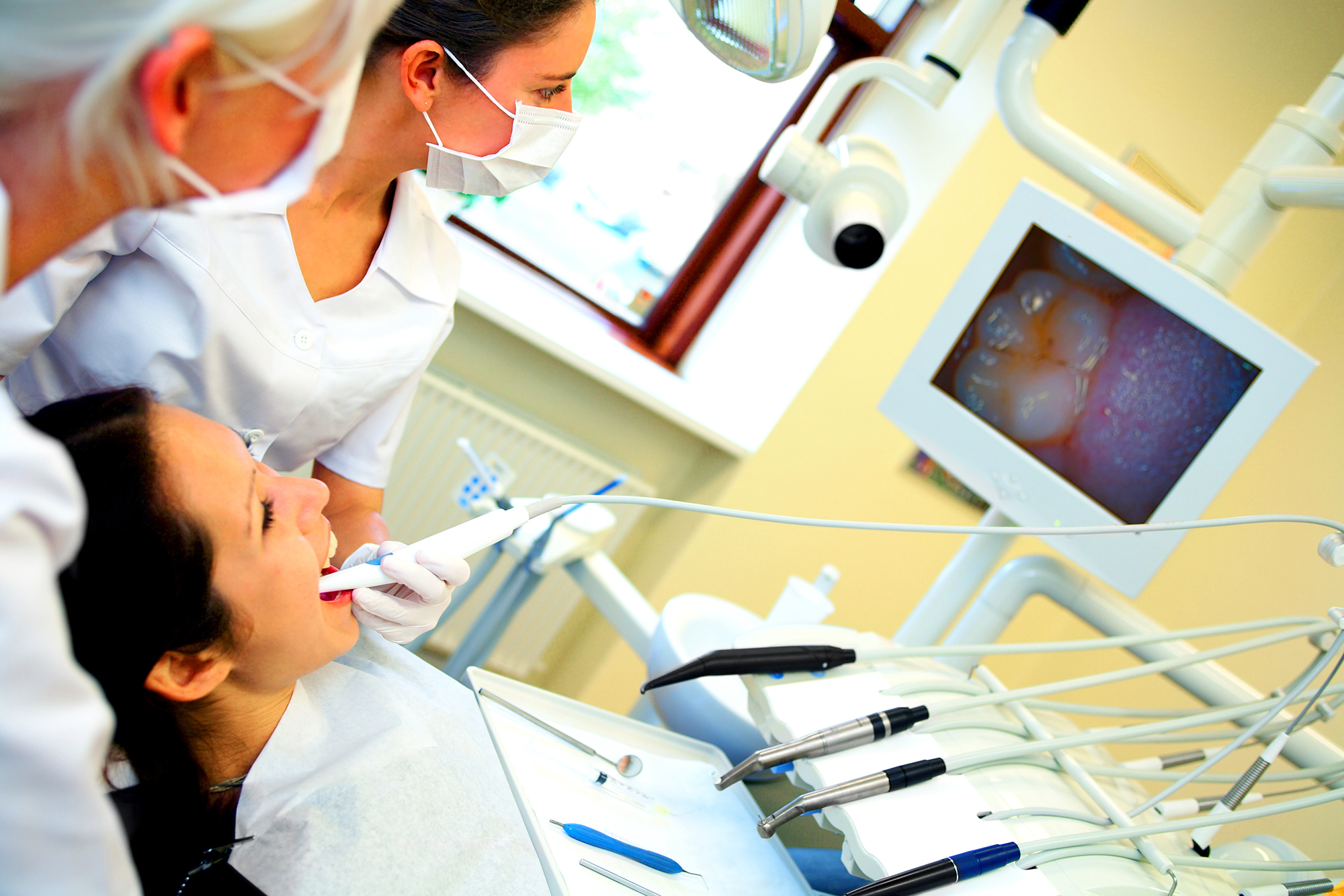 A patient with cancer undergoes preoperative oral care.