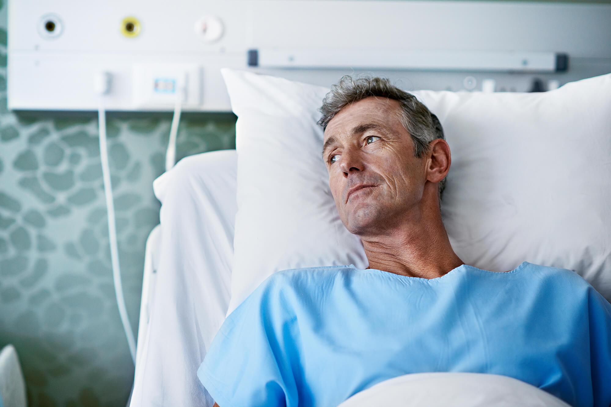 A patient with cancer waits for treatment.