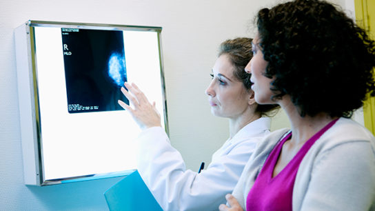 A patient receives their mammography results.