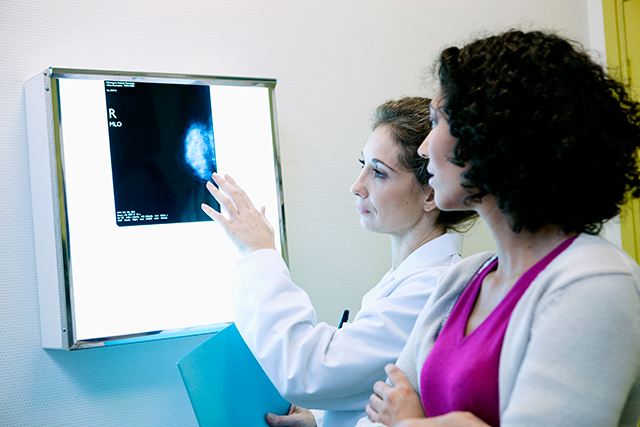 A patient receives their mammography results.