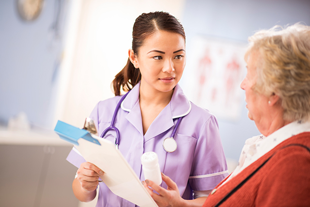 Reviewing a prescription with an older patient.