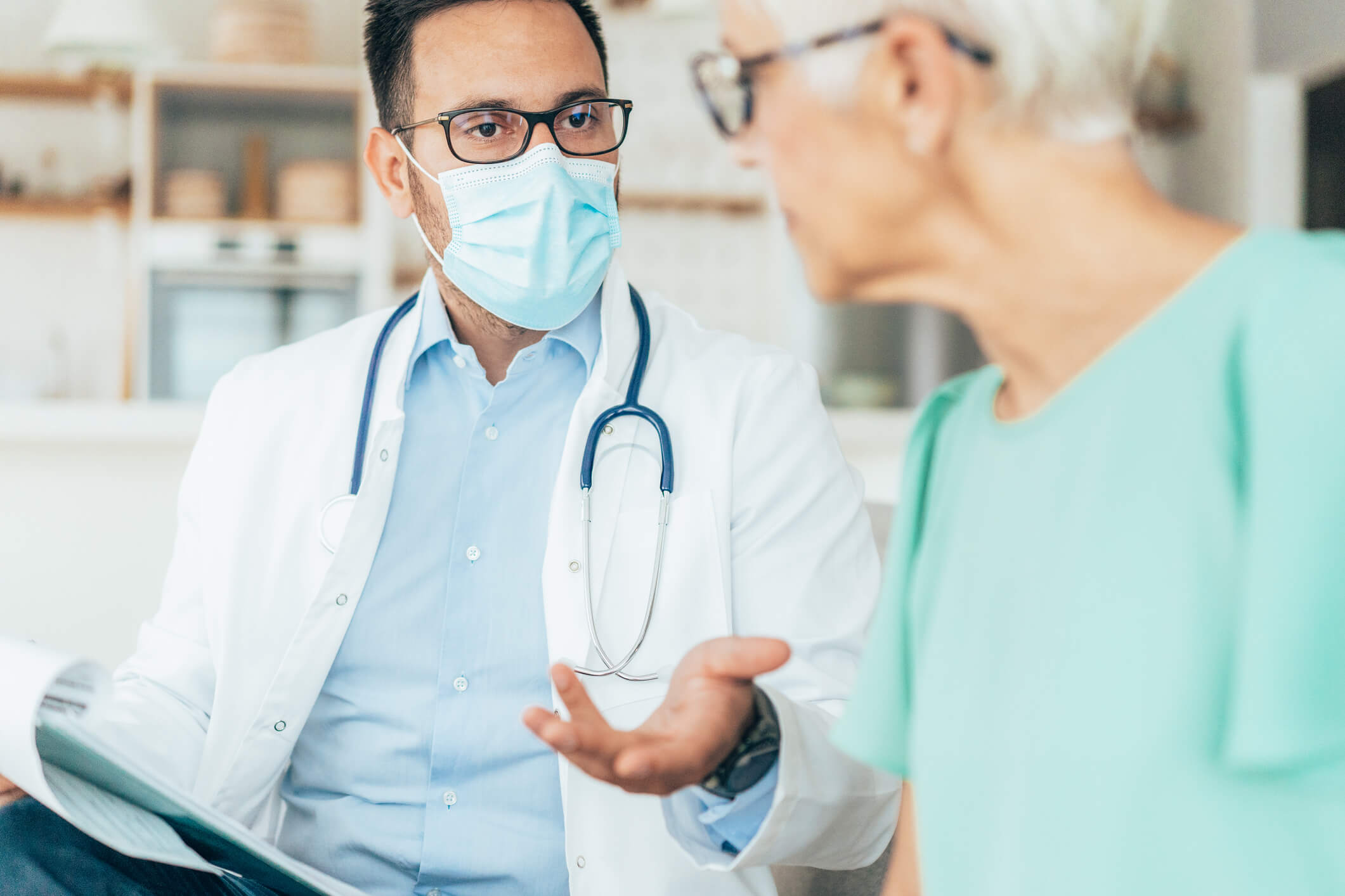 Patient talking to doctor.