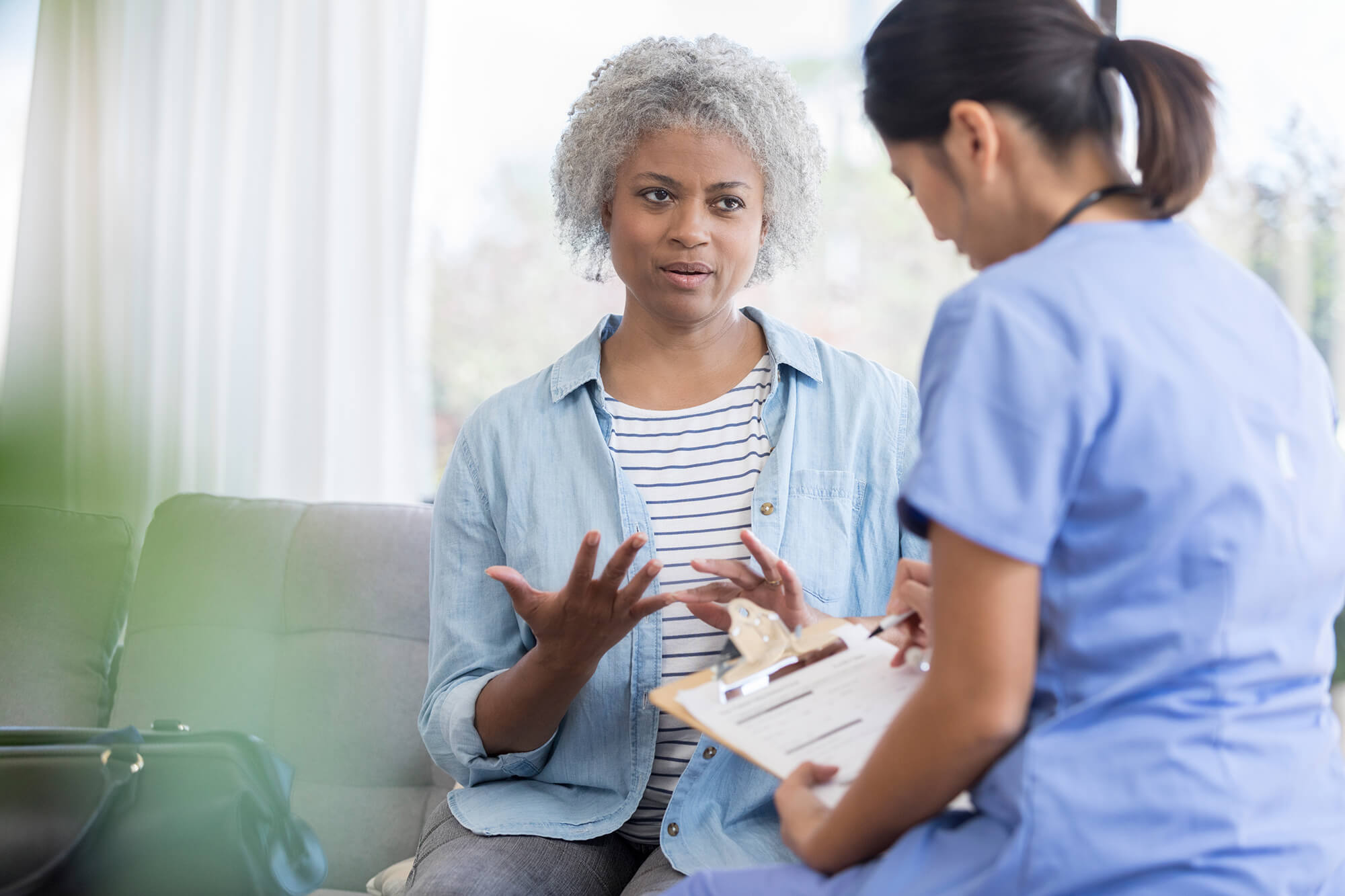 Discussing a treatment regimen with a patient.