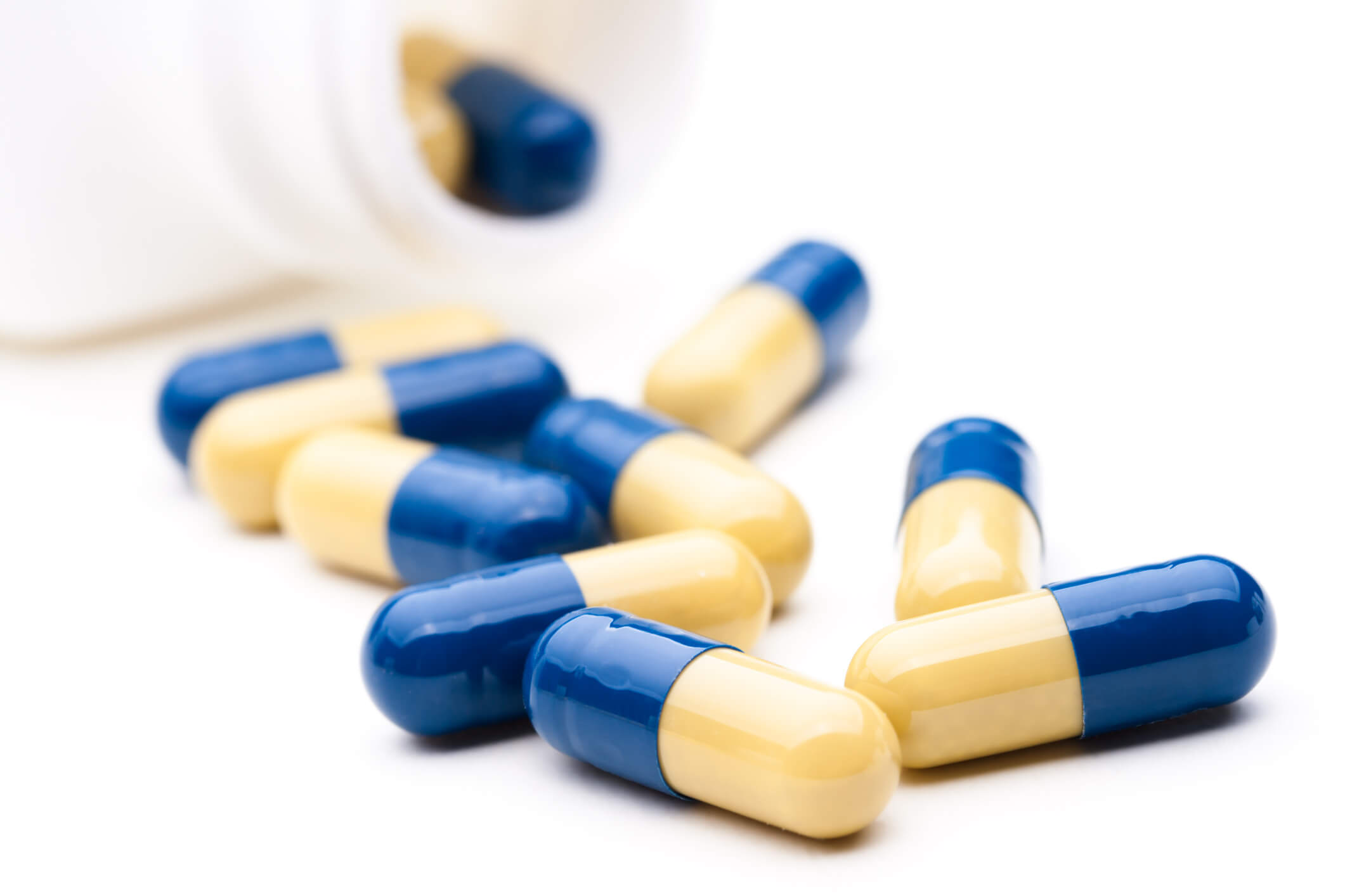 Blue and yellow capsules