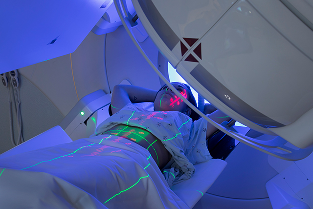 A patient undergoes cancer radiation therapy.