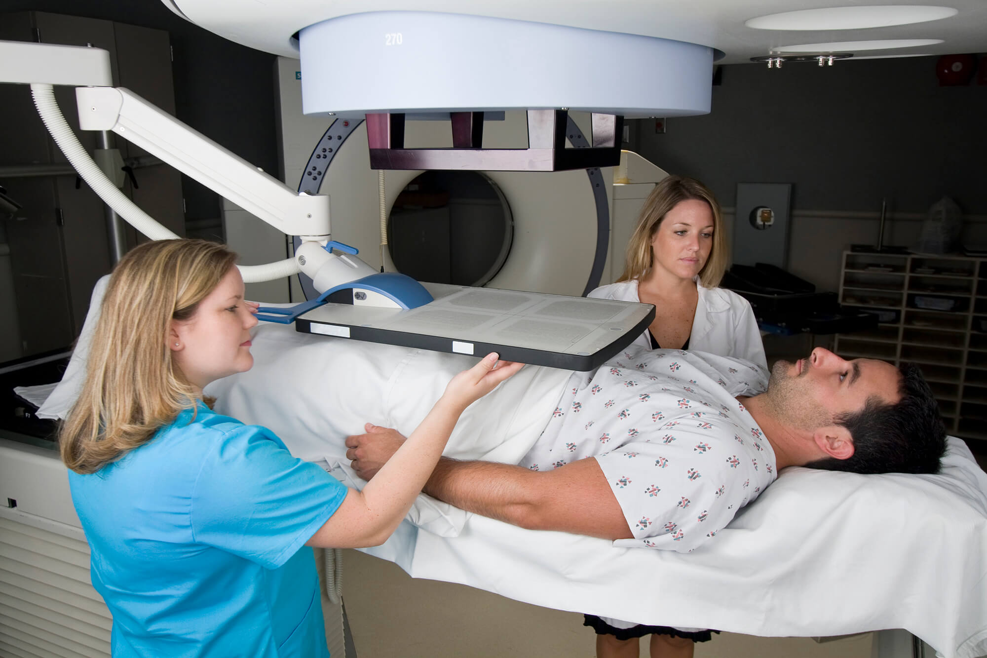 A patient receives radiotherapy treatments for prostate cancer.