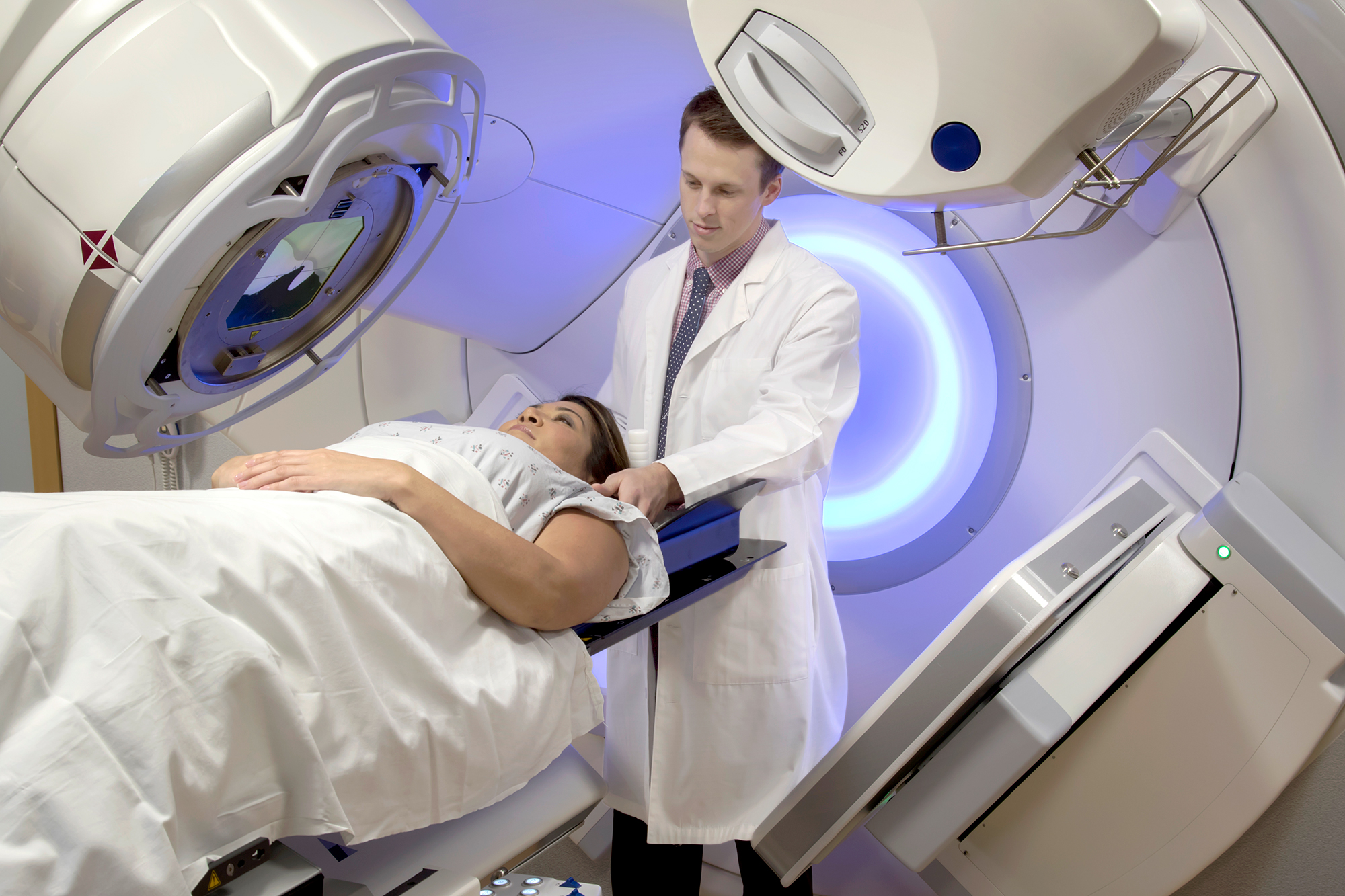 A patient receives focused radiotherapy treatment.