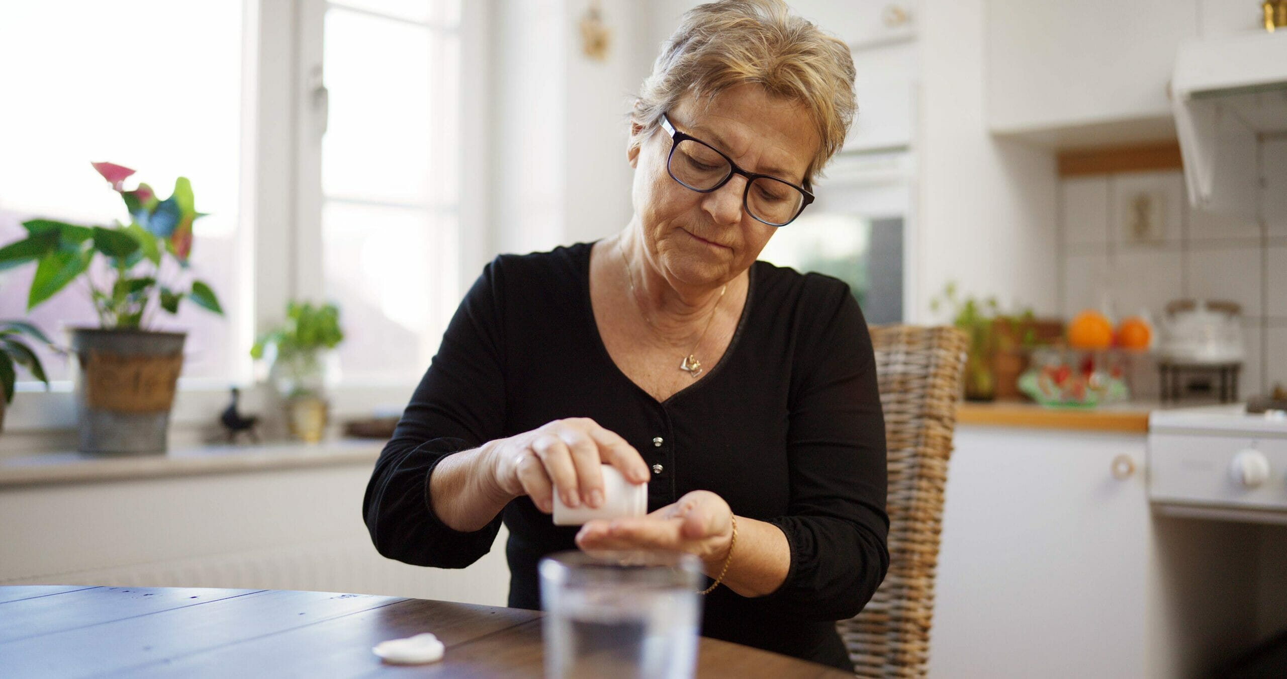 Woman taking medication