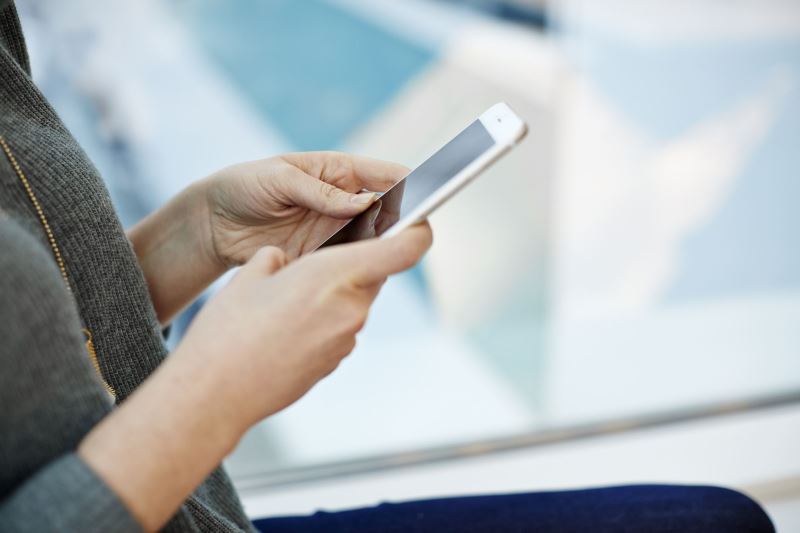 A woman using her smartphone.